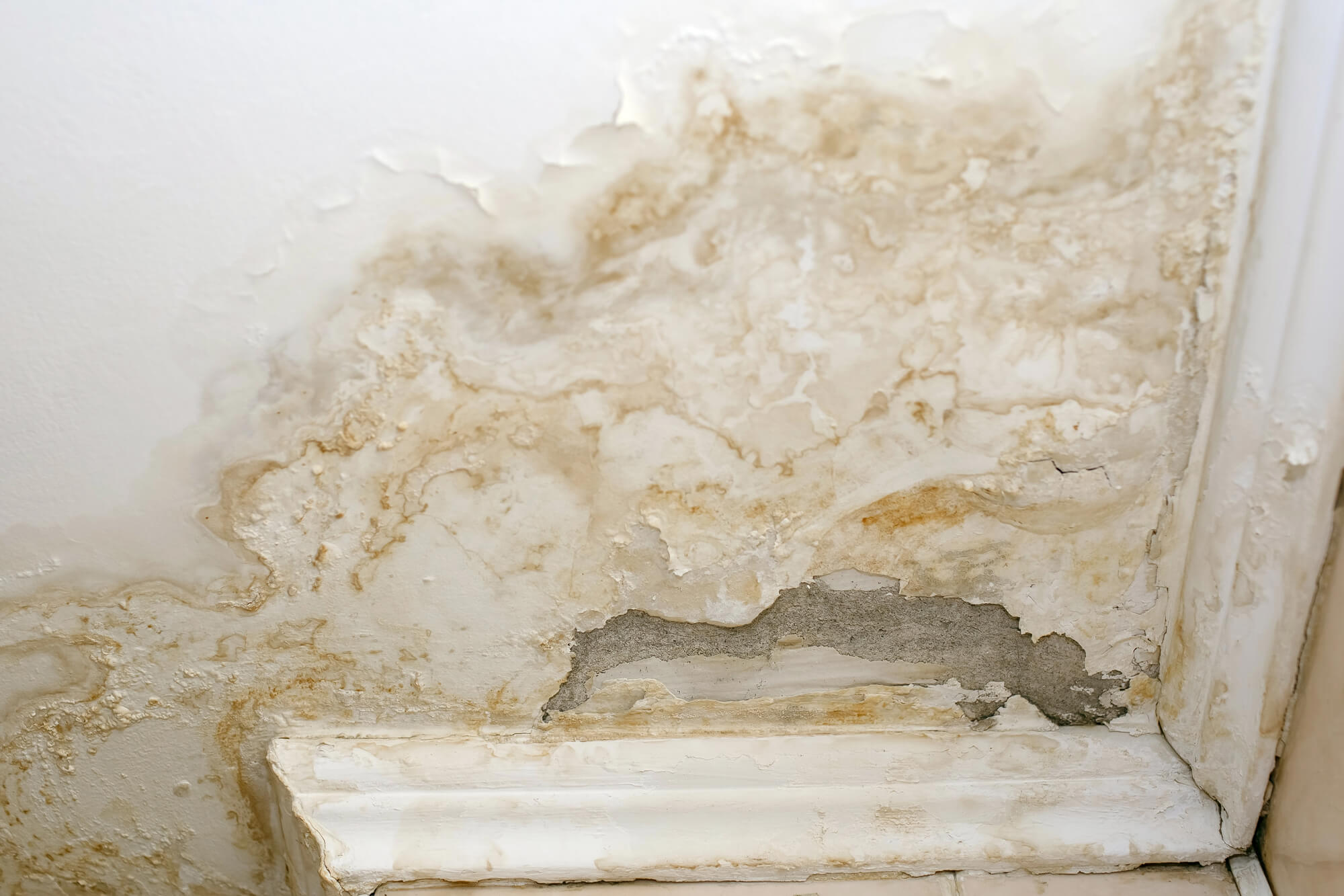Why Cracks in Ceiling Corners Could Mean Foundation Trouble